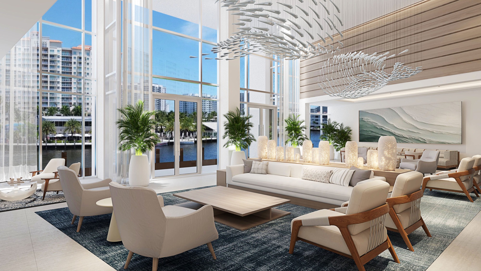 Grand double-height lobby lounge with water view